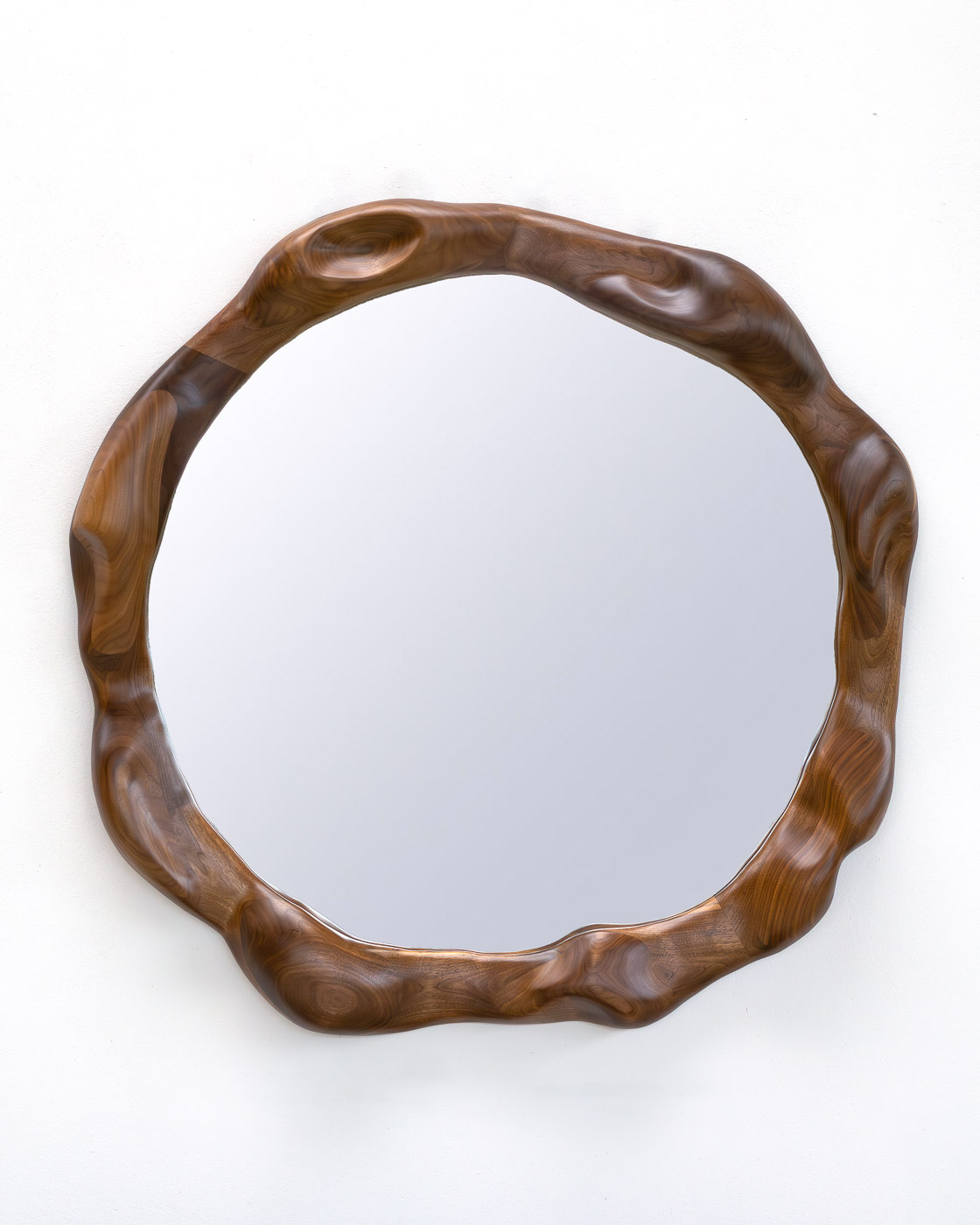 organic shaped mirror in walnut