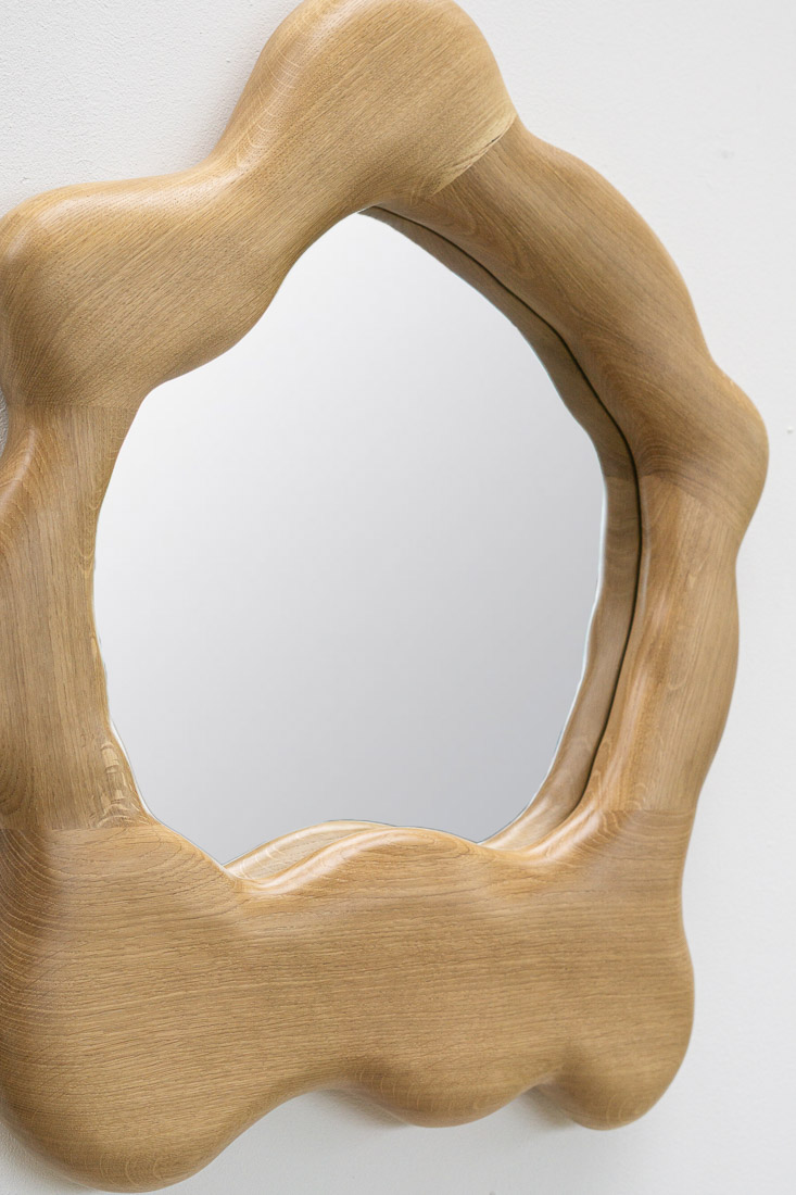 sculptural mirror in oak wood